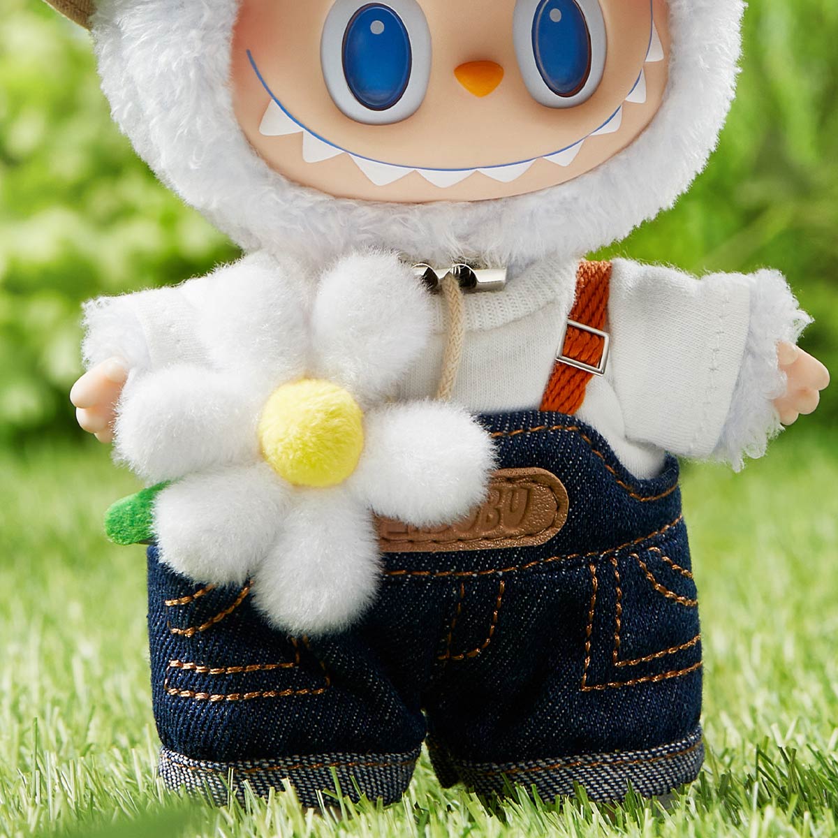THE MONSTERS FALL IN WILD SERIES - Vinyl Plush Doll Pendant - Labubu - Pop Mart - Bag Charm - Close Up of Denim Overall, White Flower